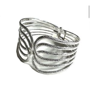 Silver tone textured hinged wide bracelet
